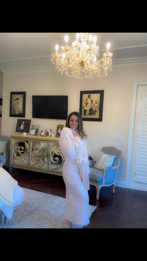 Instagram post by @steph_lagrossa_kendrick for LUXOME. Caption reads: Living in my LUXOME ultra plush robe and throw....