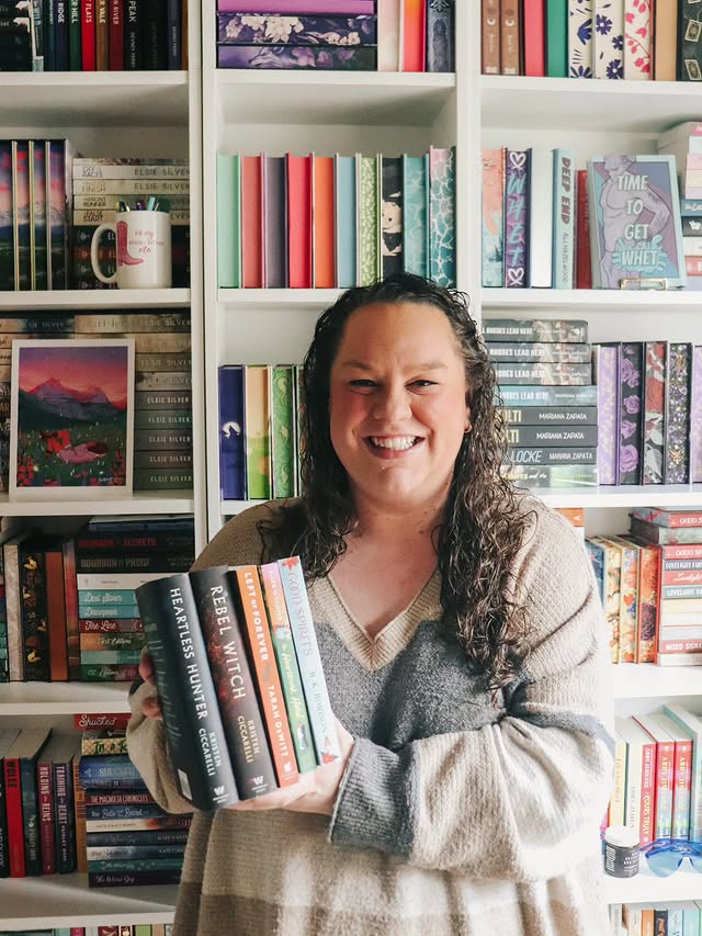 Instagram post by @megan.reads.romance for BookSparks. Caption reads: [...] the bag! I can finally share that....