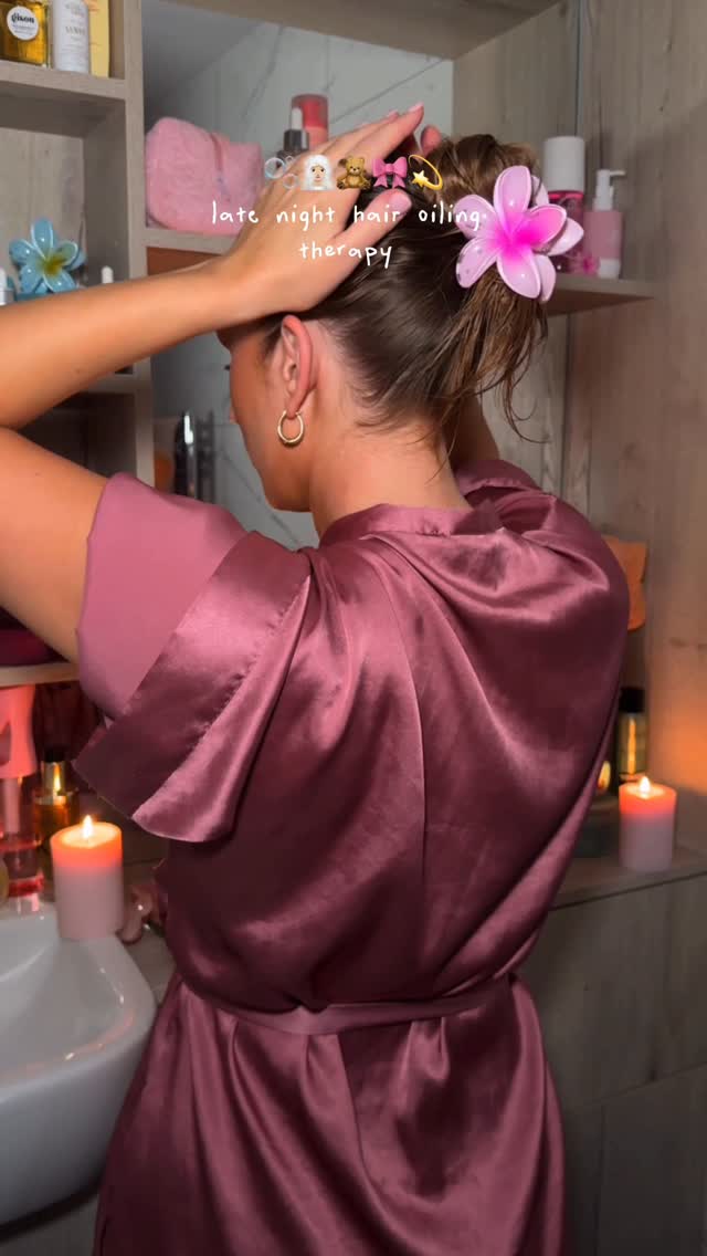 Instagram post by @byemmaleah for VEGAMOUR. Caption reads: late night hair oiling therapy....