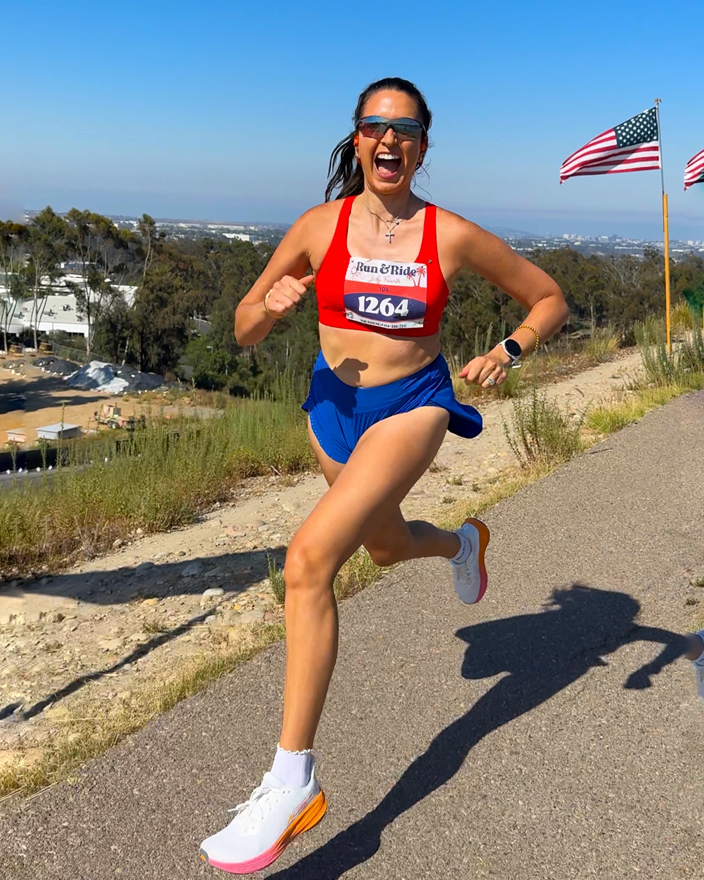 Instagram post by @trackclubbabe for Shokz. Caption reads: 🔥POSTPARTUM 10K PR!!!!!!!!!!!!!!!!🔥

I wasn’t....