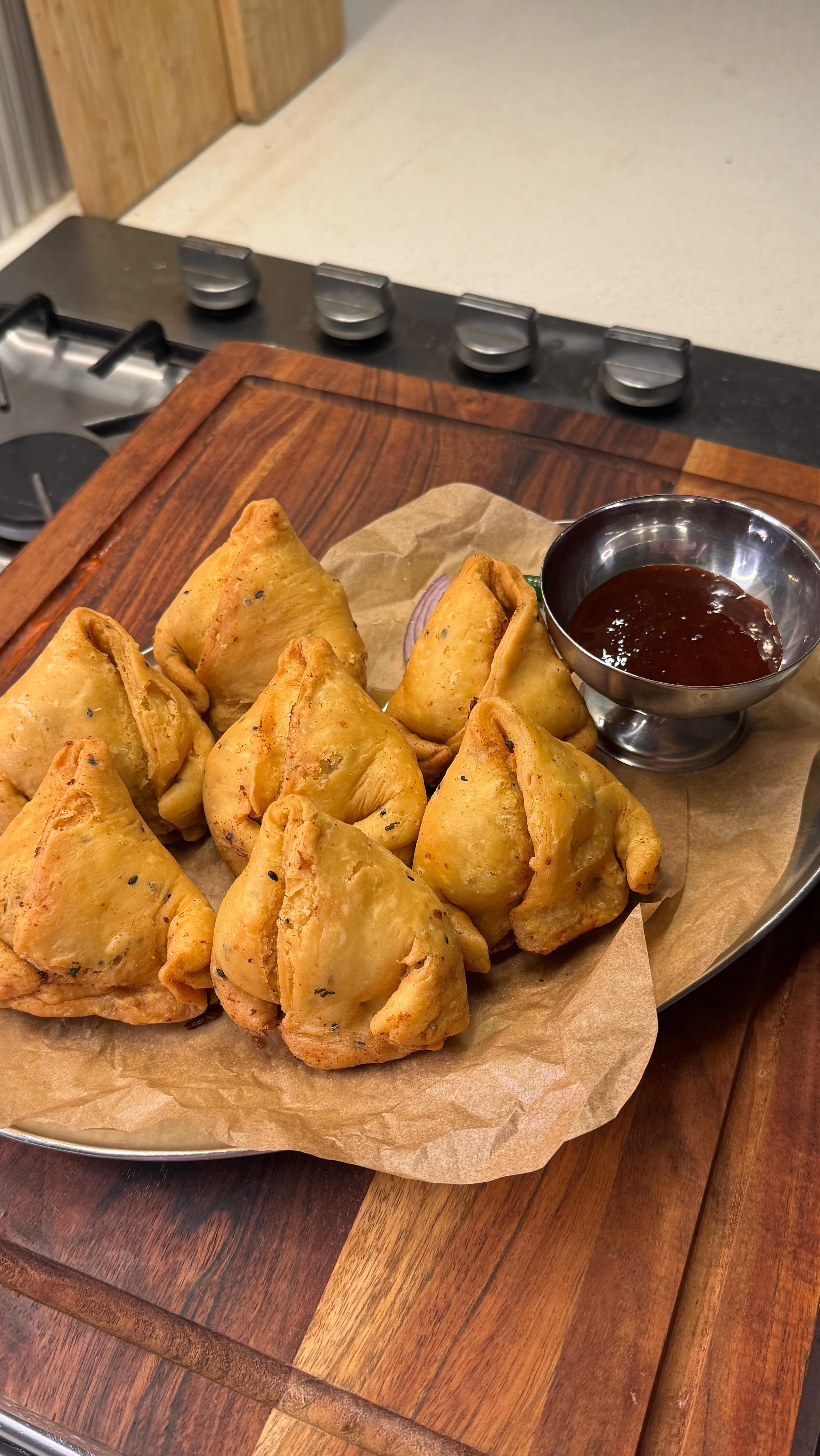 Instagram post by @yourlilcook for Bioré. Caption reads: My deshi comfort- episode 6.
✨ Kolija shingara for....