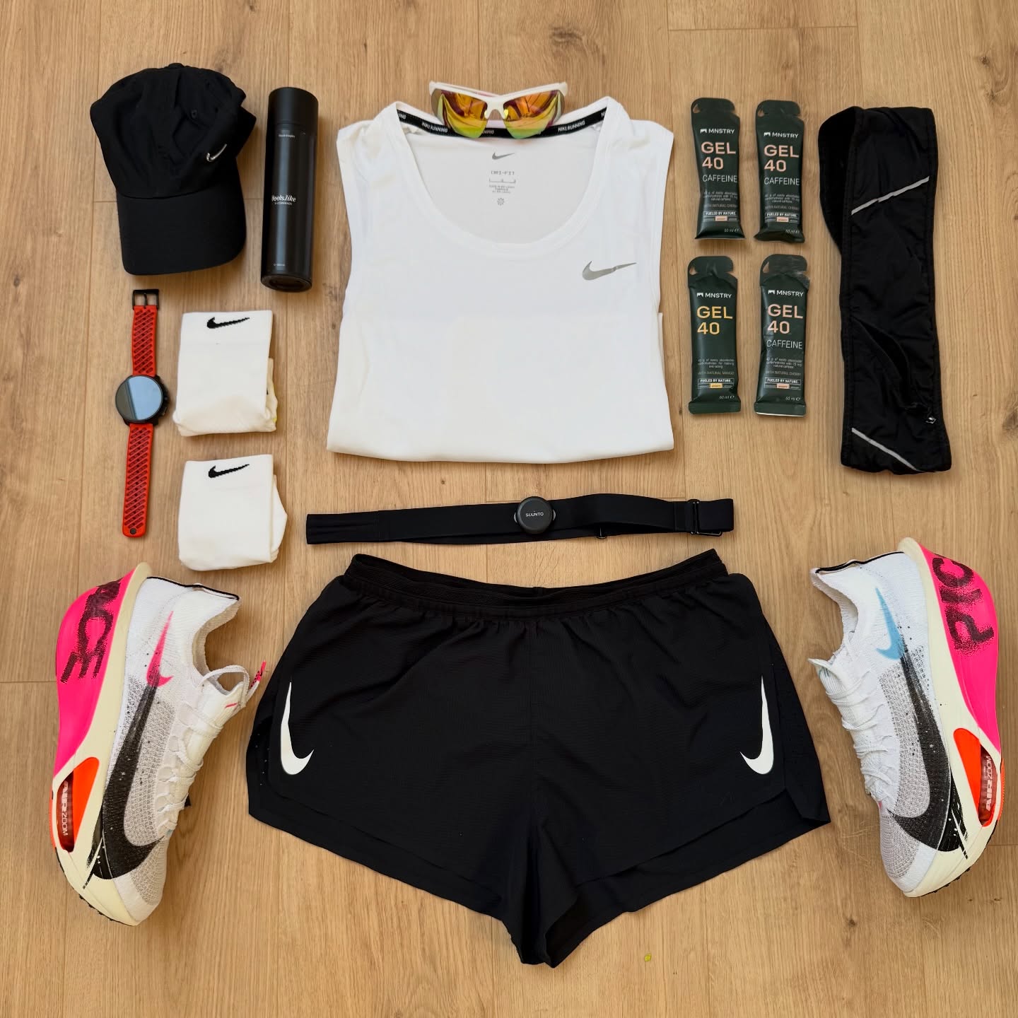 Instagram post by @running_devil for Suunto. Caption reads: [...] race kit? 👀🔥 👓: @dm_deutschland ⌚️:....