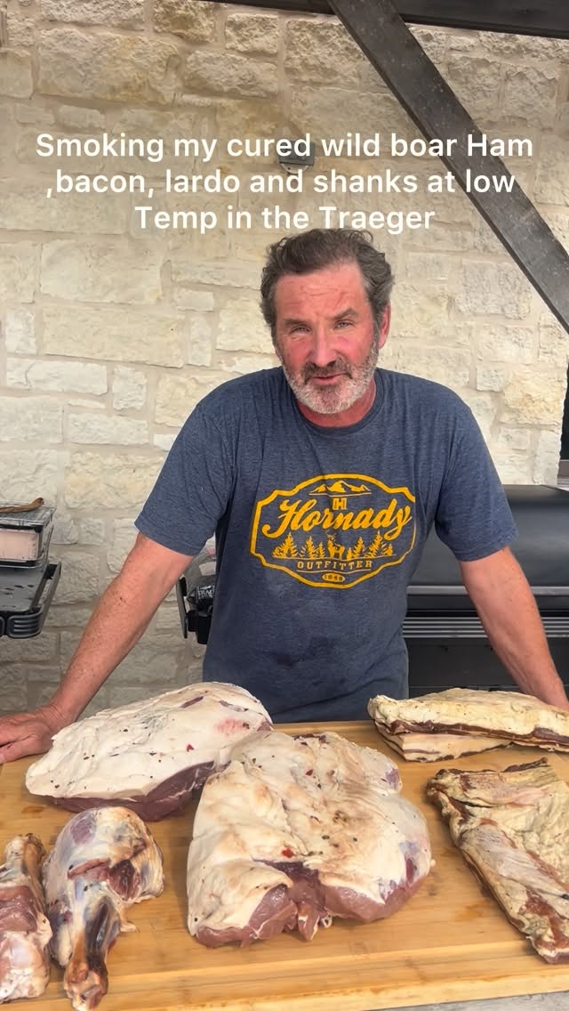 Instagram post by @mikerobinsonchef for Traeger Grills. Caption reads: Smoking my Christmas hams in the @traegergrills....