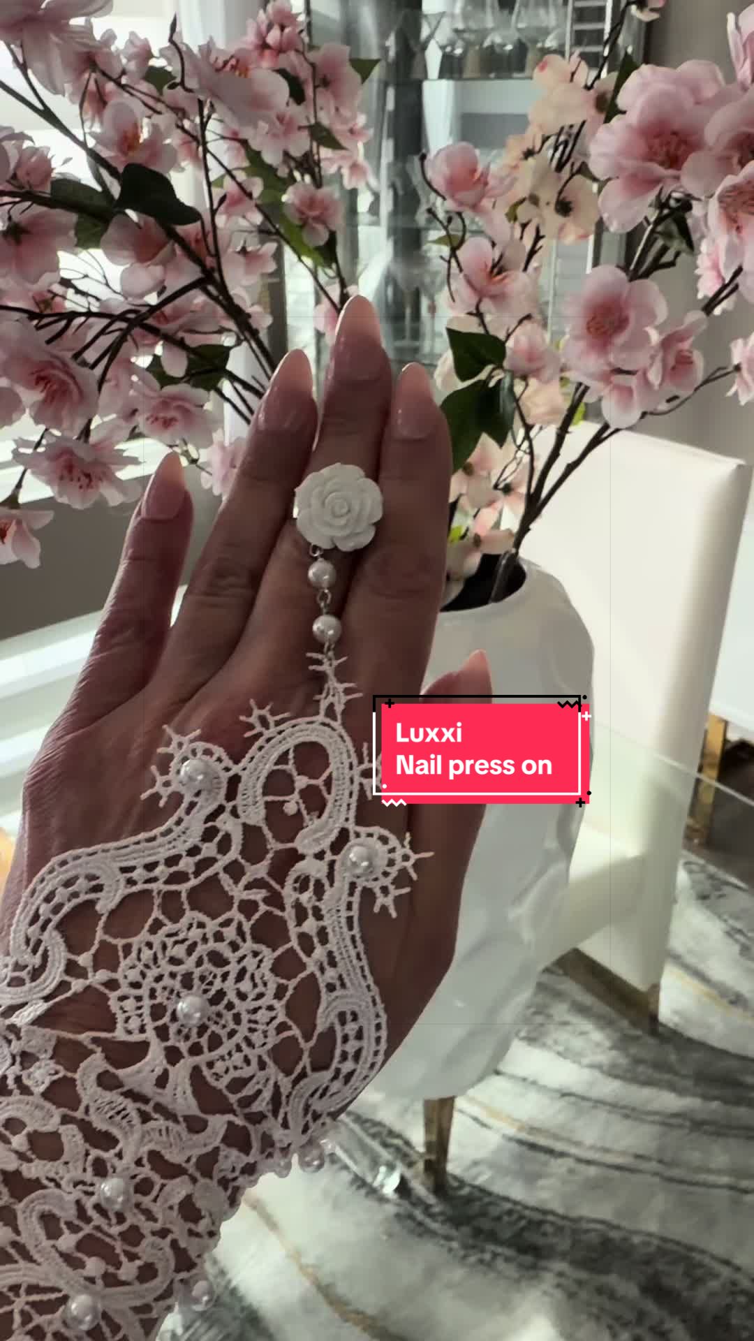TikTok post by @sophiadecor for Luxxi Nails. Caption reads: @LUXXI NAILS #pressonnails #cleangirlnails [...].
