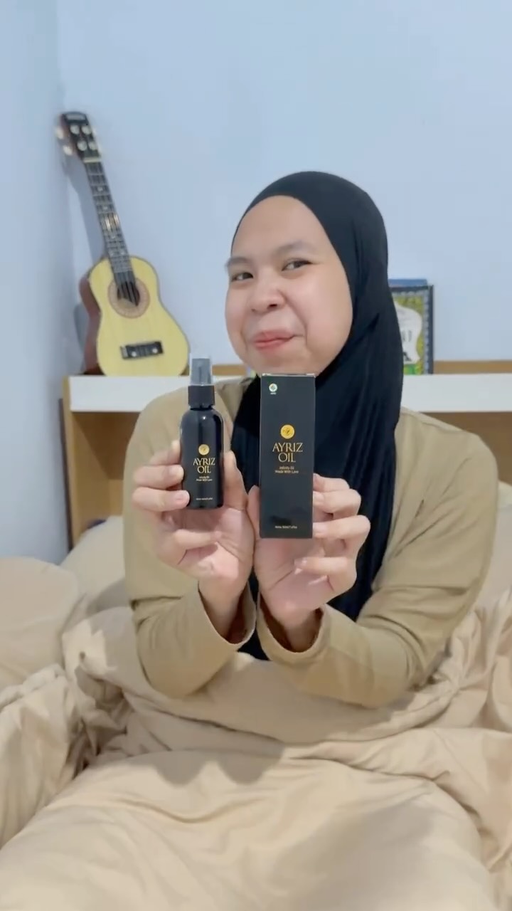 Instagram post by @ginahmardeanah for Ayriz Oil Indonesia. Caption reads: Pernah gak sih, pulang kerja badan terasa pegal,....