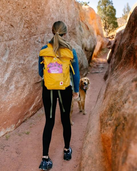 Instagram post by @coloradomountaintowns for Earthborn Holistic Pet Food. Caption reads: Happy Earth Day, Colorado ❤️🌎

Addie + I are....