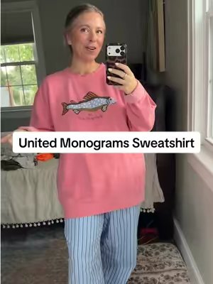 TikTok post by @erinbparris for United Monograms. Caption reads: [...] Thank god for comfy sweatshirts. @United....