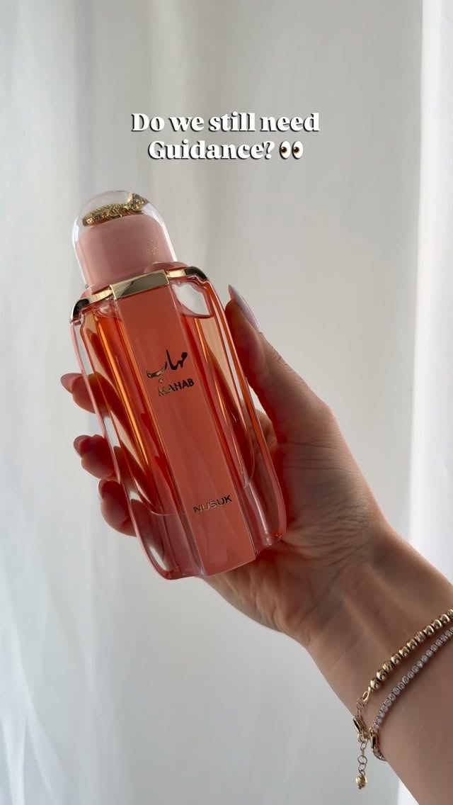 Instagram post by an influencer for Nusuk Perfumes. Caption reads: do you like Guidance dna? Mahab by @nusuk_perfumes....
