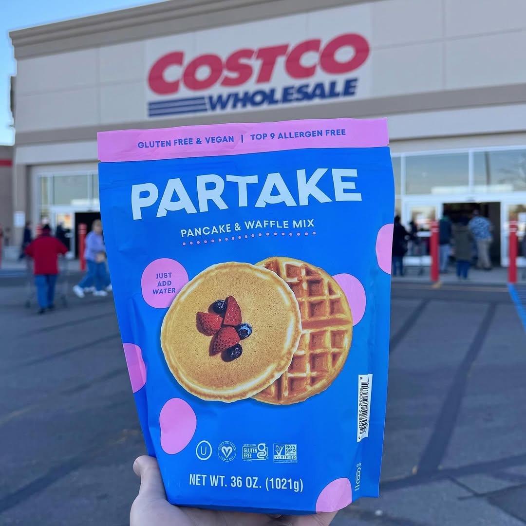 Instagram post by @costcobuys for Partake Foods. Caption reads: @PartakeFoods Classic Pancake & Waffle Mix is NEW....
