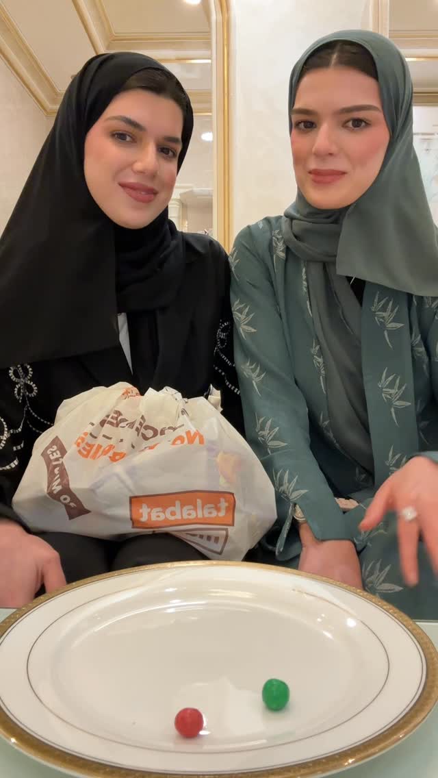 Instagram post by @974twins for talabat. Caption reads: Poison Candy Challenge 🧡🧡

طلبنا كل شي من طلبات....