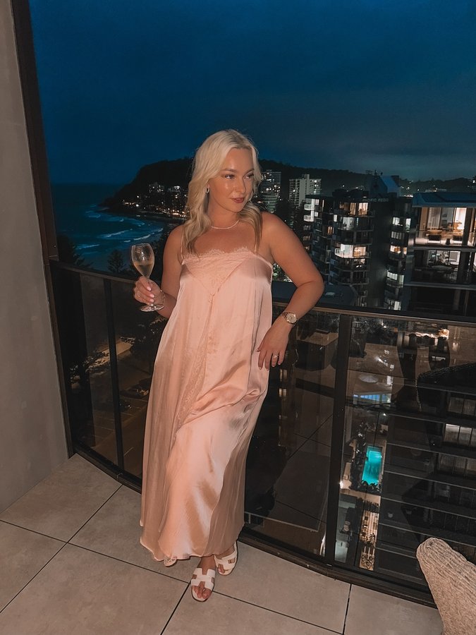 Instagram post by @natkalinowski for Petalandpup. Caption reads: Love the sound of the water hitting the sand in....