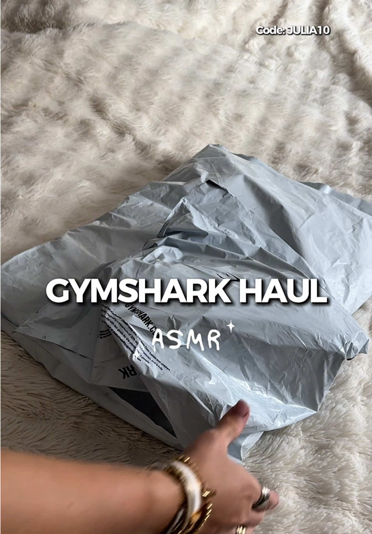 TikTok post by @julialni for Gymshark. Caption reads: Anzeige | @Gymshark @Gymshark Women code “JULIA10”....