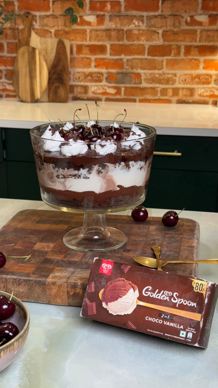 Instagram post by @lets_eat_with_prachi for Kwality Wall's. Caption reads: Black Forest, but make it bougie 🍒🍫✨ One spoon....