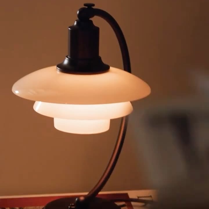 Instagram post by @malenebirgers_world for Louis Poulsen. Caption reads: Introducing the PH Aged Brass collection for 2025.....