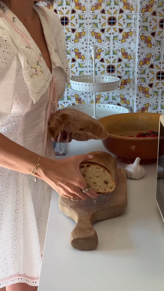 Instagram post by @chloecleroux for For Love & Lemons. Caption reads: Making a perfectly simple Bruschetta in Italy with....