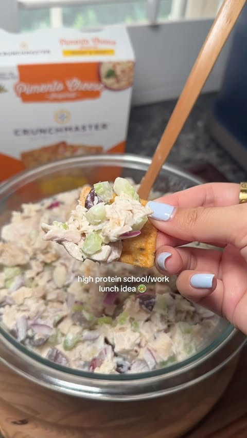 Instagram post by @biteswithesther for Crunchmaster Crackers. Caption reads: [...] salad that pairs perfectly with....