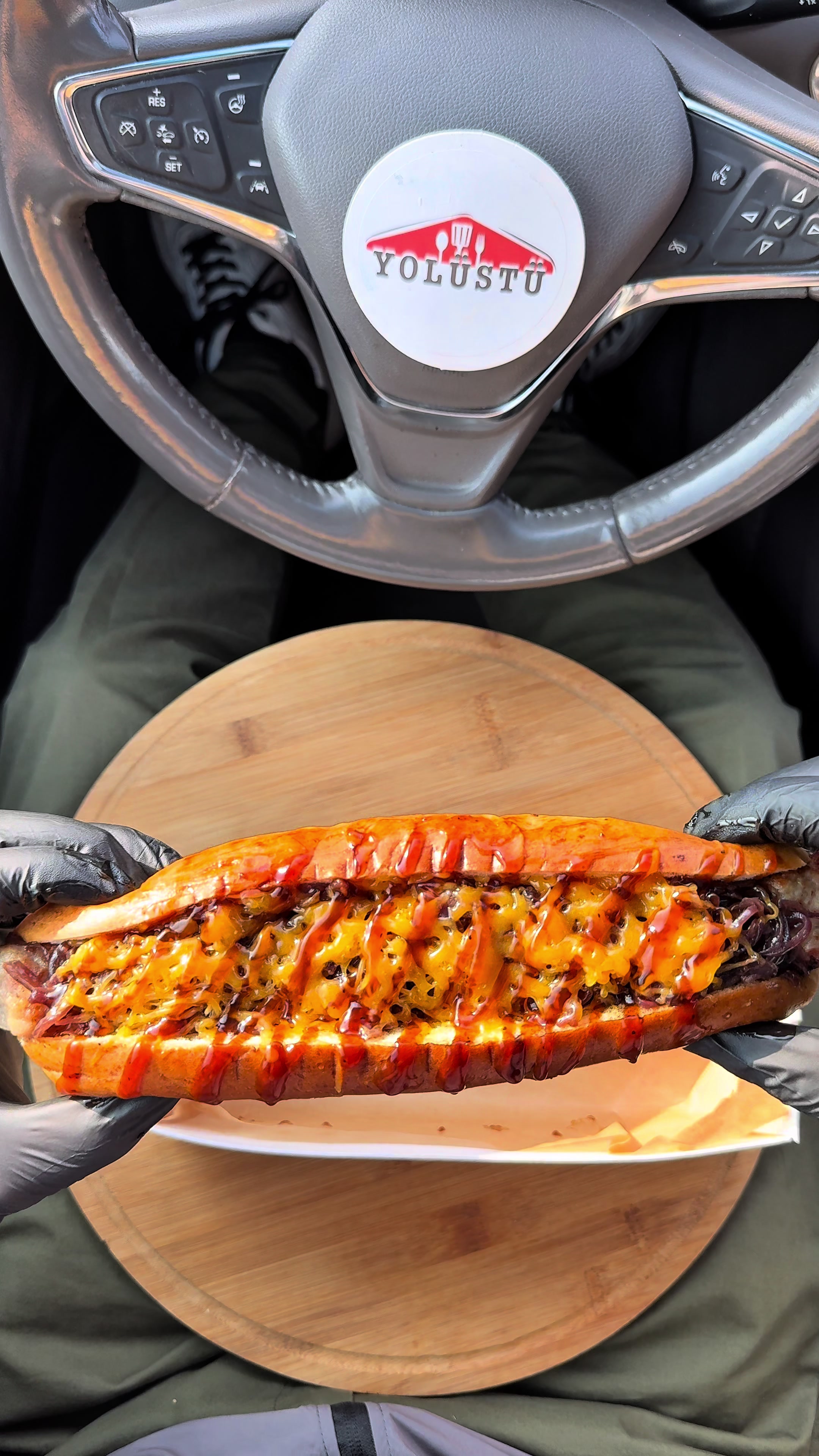 TikTok post by @yolusdu for Wolt. Caption reads: 🌭🌯Fastbazar Baku  @fastbazar.baku  🛵 wolt....