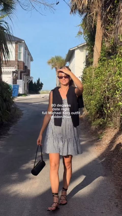 Instagram post by @abbycatlin for Michael Kors. Caption reads: perfect summer night in @michaelkors mkpartner.