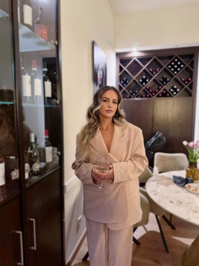 Instagram post by @emirjona_grizhja for Parents. Caption reads: I am paid to exist 🤪 what I seek, seeks me back,....