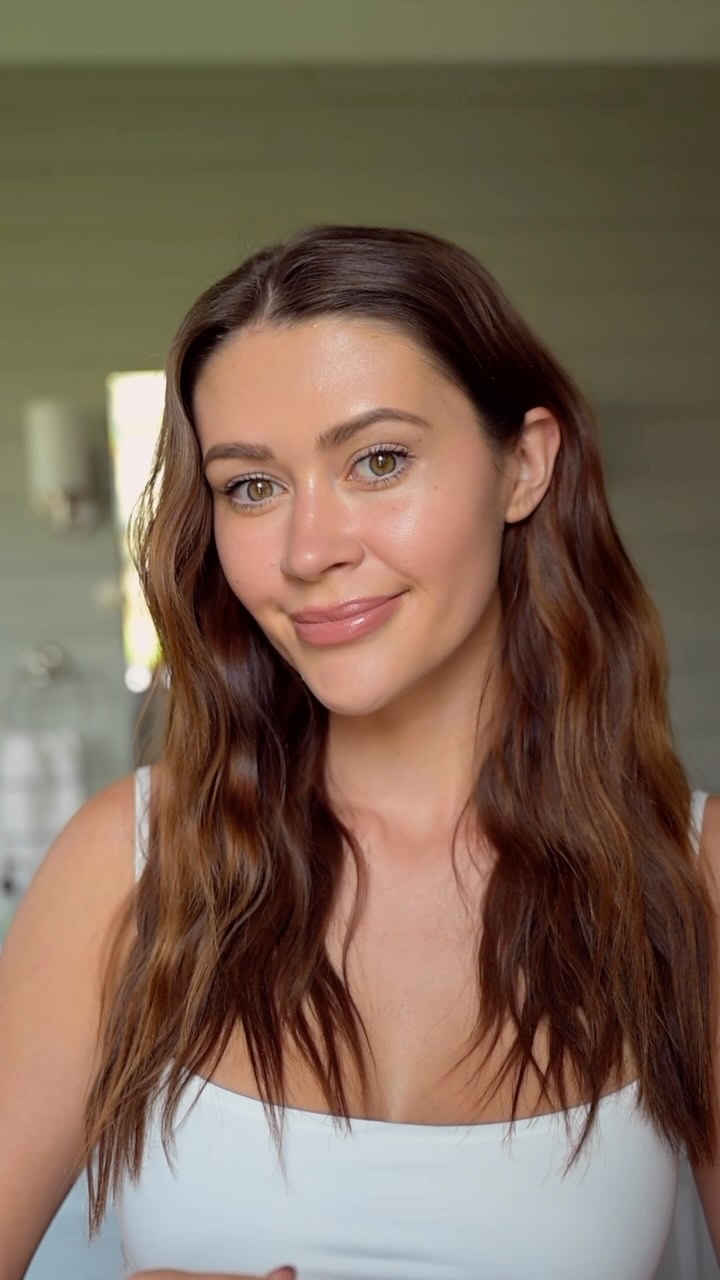 Instagram post by @caelynnbell for RMS BEAUTY. Caption reads: My simple, glowy makeup routine using my favorite....