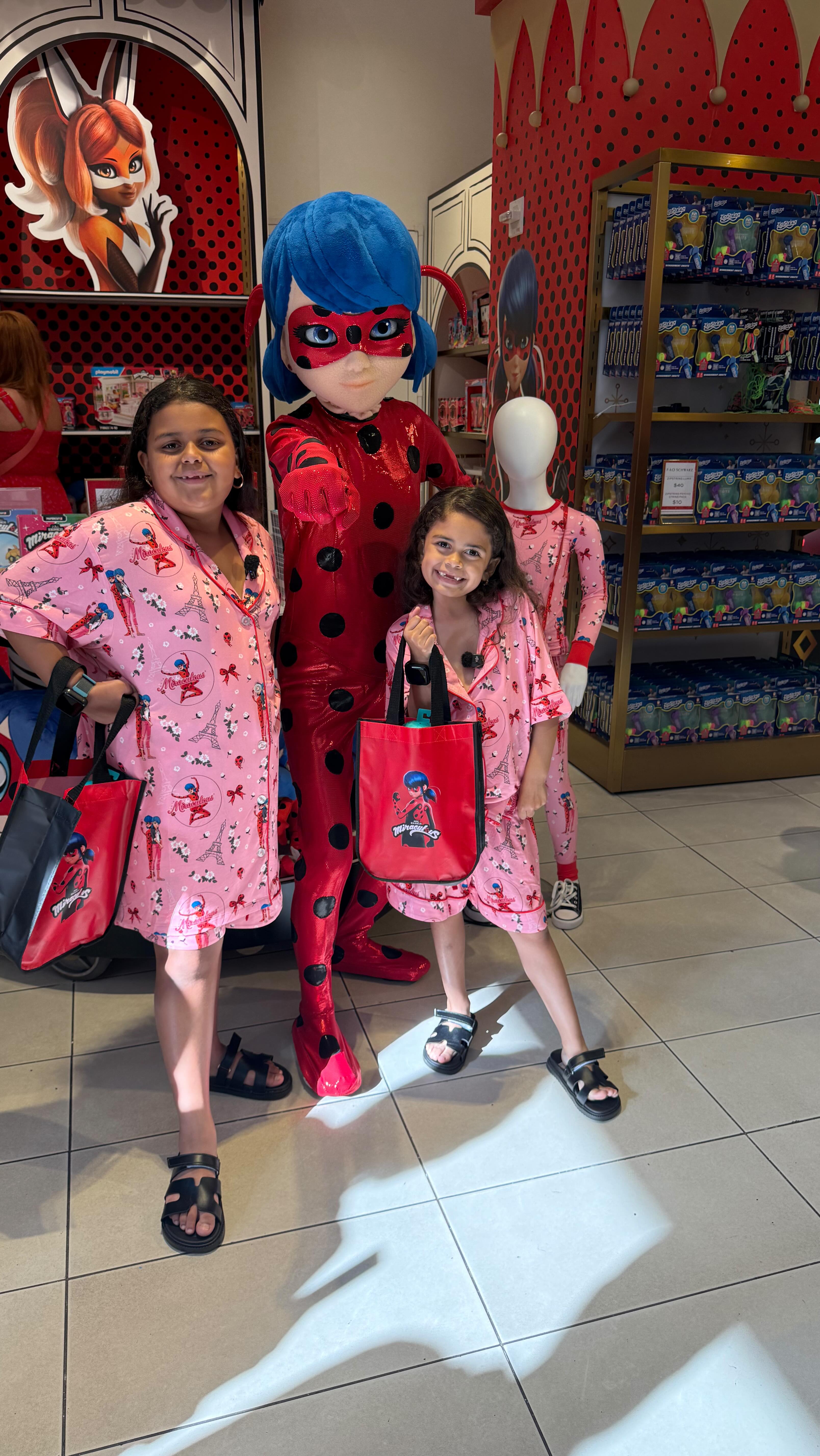 Instagram post by @haileyandbailey_ for FAO Schwarz. Caption reads: [...] Pajama Party at the iconic @faoschwarz and....