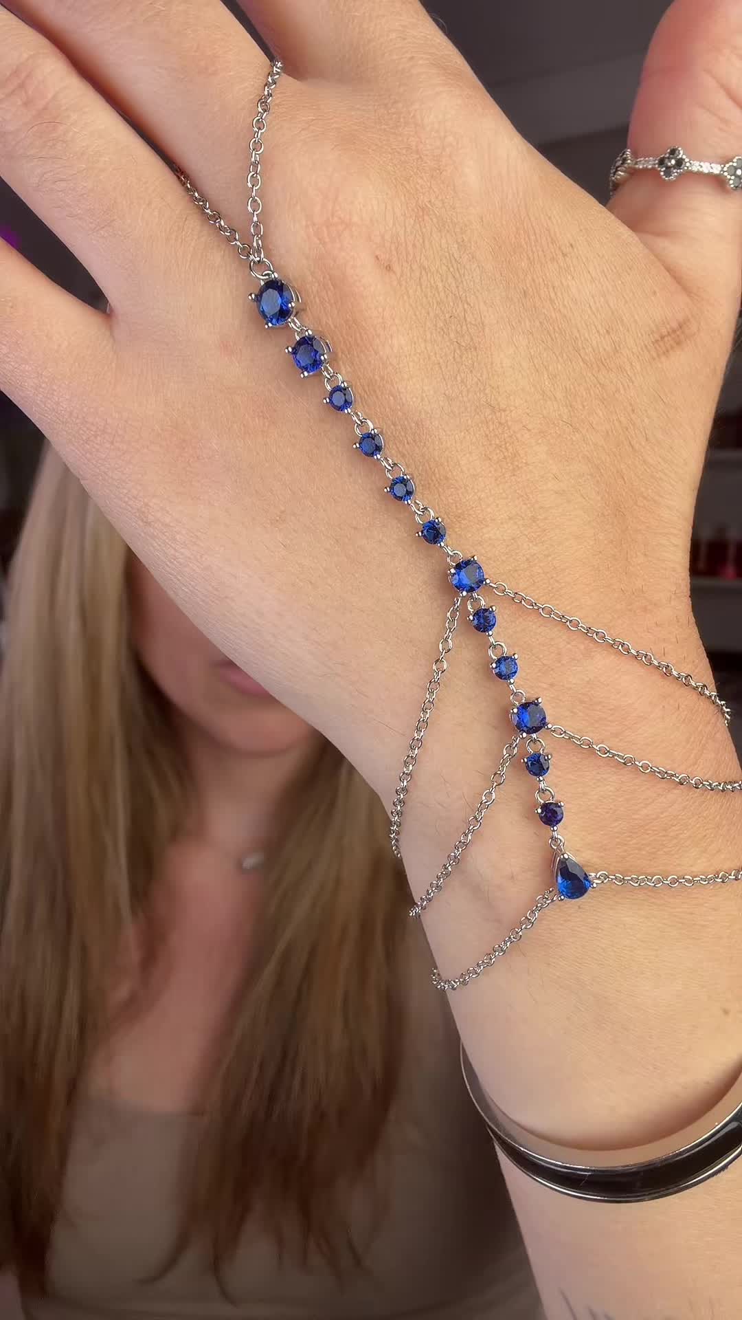 TikTok post by @abbey.kline for Sterling Forever. Caption reads: It’s just so pretty @Sterling Forever #handchain.