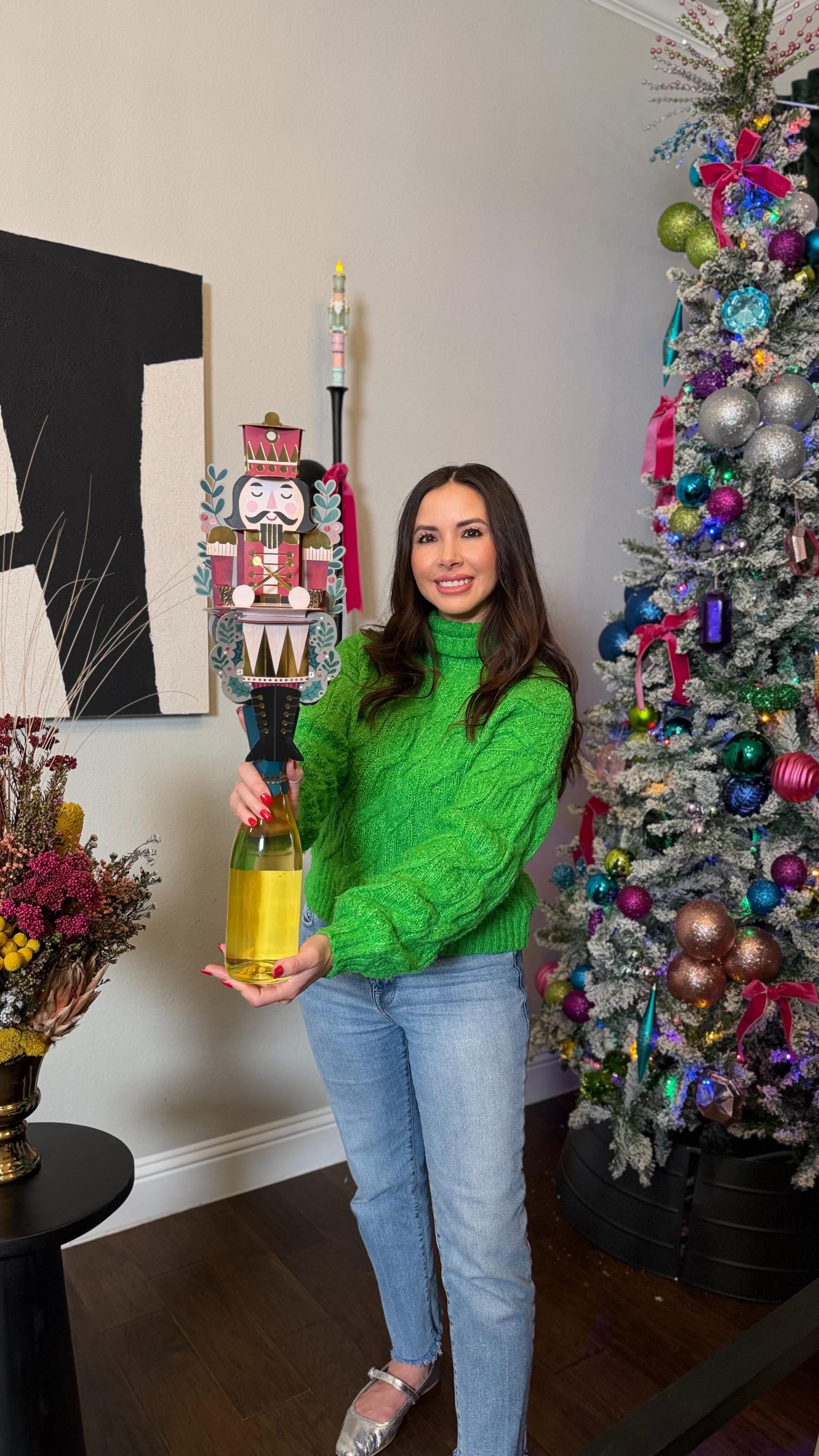 Instagram post by @notyouravg_mom for American Greetings. Caption reads: Just discovered these @AmGreetings Bottle Toppers....