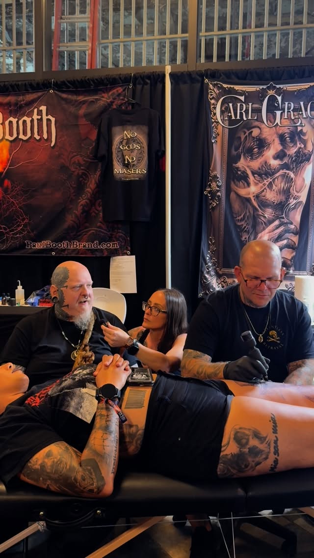 Instagram post by @melanieczoka for Sullen Clothing. Caption reads: @paulbooth & @carlgracetattoos talk about....