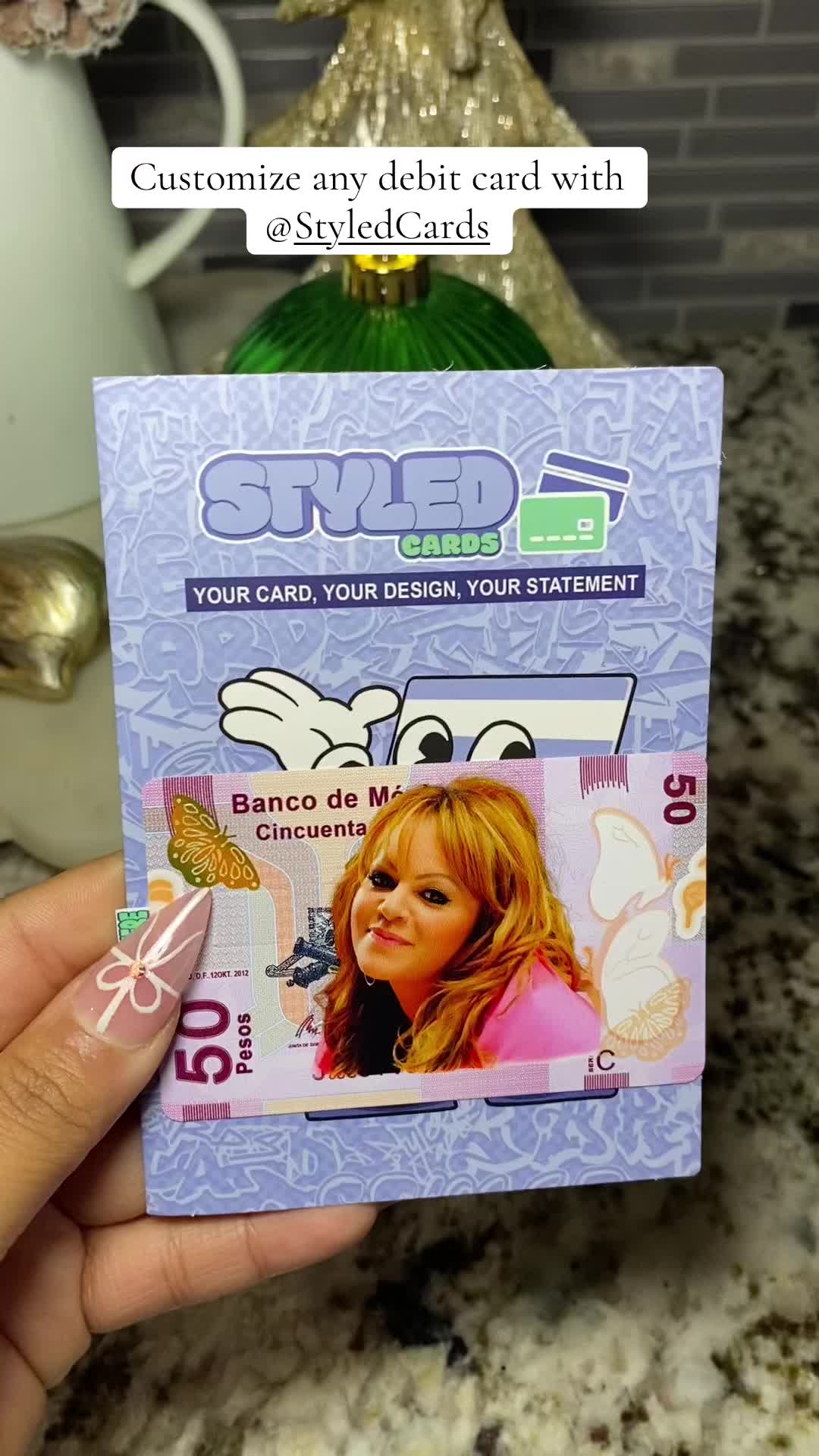 TikTok post by @nanalicious10 for Styled Cards. Caption reads: [...] #fyp #debitcardskin #styledcards #tiktok.