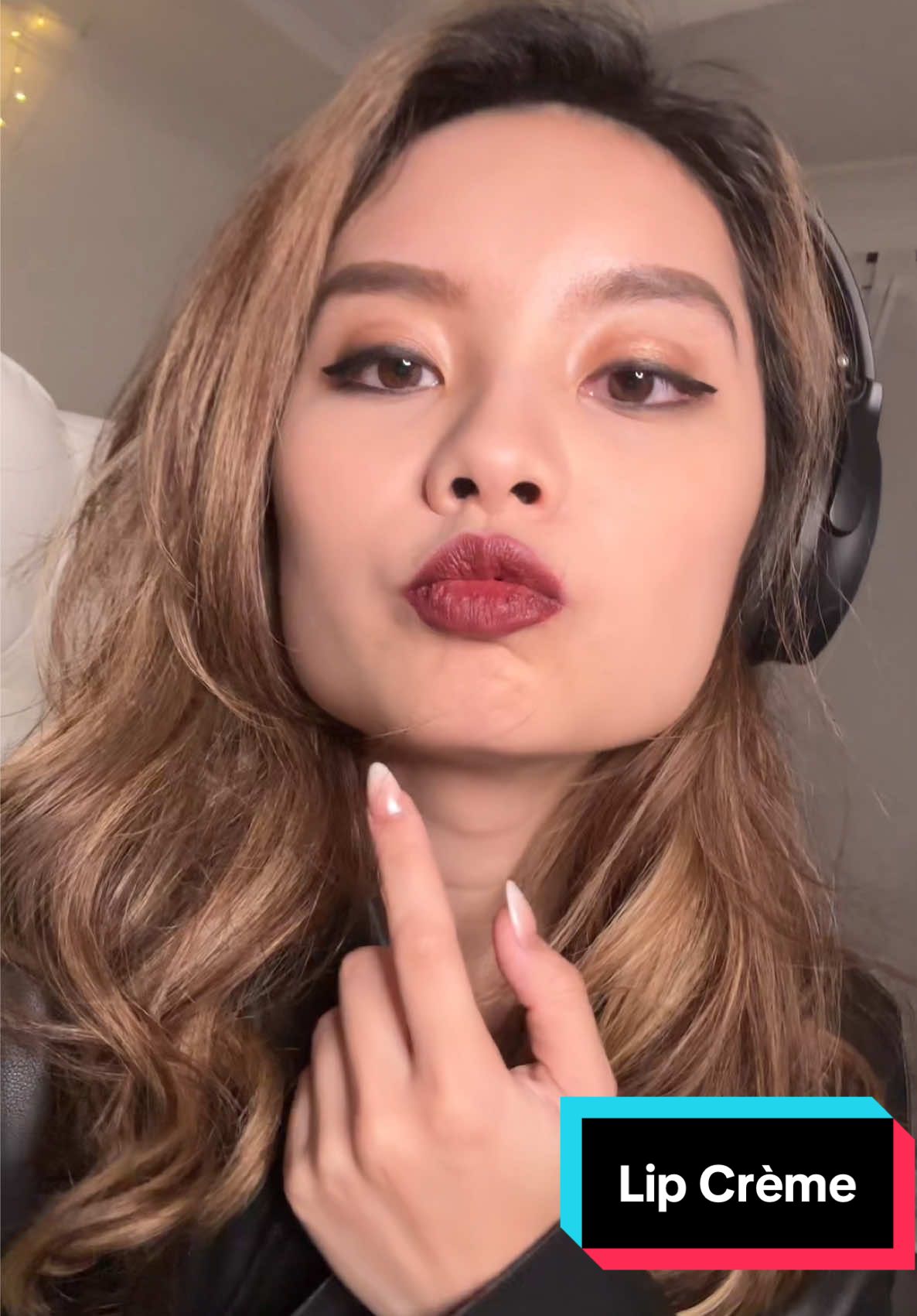 TikTok post by @stylecirce for EM Cosmetics. Caption reads: @EM Cosmetics by Michelle Phan Soft Spoken Lip....