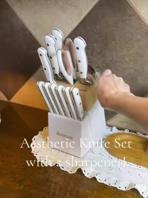 TikTok post by @kelsey.calnan for Astercook. Caption reads: Your kitchen NEEDS these 😍 @Astercook USA....