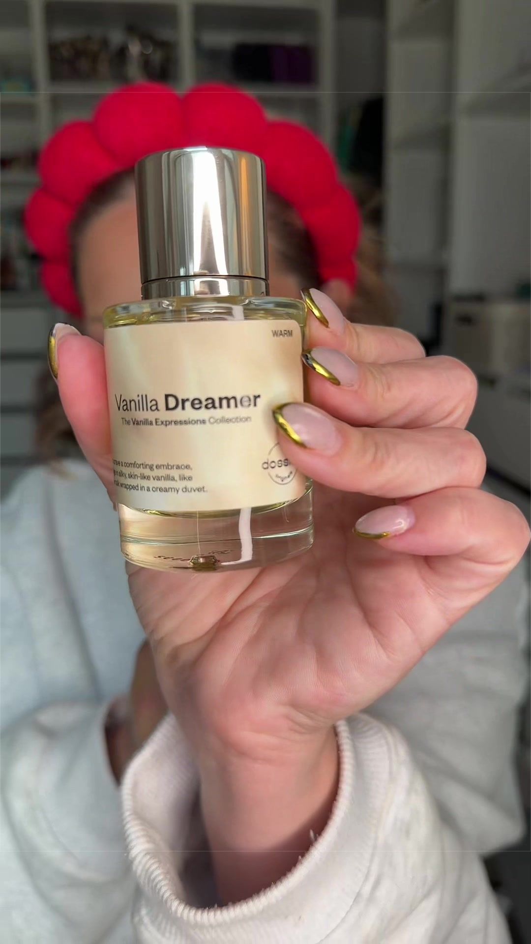 TikTok post by @itsabbyak for Dossier. Caption reads: @Dossier Perfume #dossierperfumes [...].