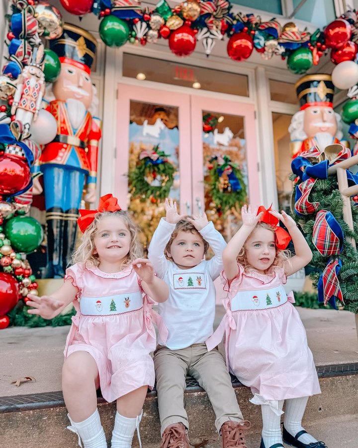 Instagram post by @doubleshotofbabies for Classic Whimsy. Caption reads: Making every Christmas moment a milestone with....