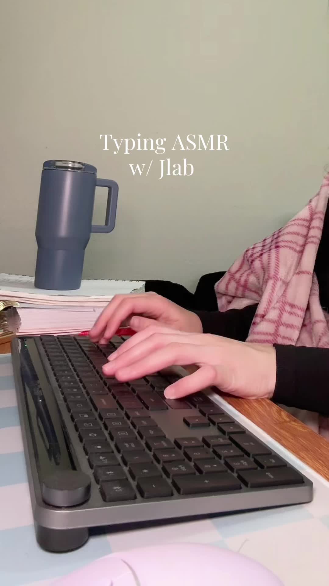 TikTok post by @raisingbabyt for JLab. Caption reads: Typing just got EPIC 😎 @JLab #typingasmr #typing....