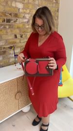 Instagram post by @whoisthatlondonmum for Orla Kiely. Caption reads: [...] heels from @hottershoes and an old....