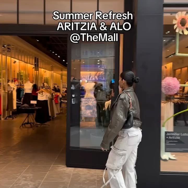 Instagram post by @slaywithateia for Aritzia. Caption reads: A Summer refresh is necessary @rooseveltfieldmall....
