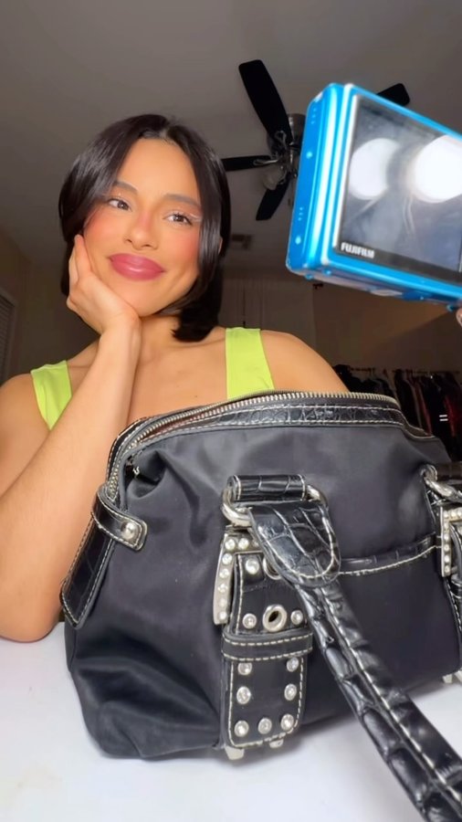 Instagram post by @sterlingtorress for Bang Energy. Caption reads: what’s in my bag from your modern day bruja....