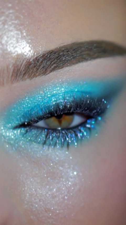 Instagram post by @jessicarose_makeup for ColourPop Cosmetics. Caption reads: Water type 🌊💙 using the @colourpopcosmetics x....