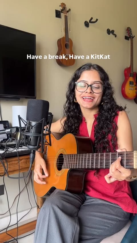 Instagram post by @aasheedhiman for KITKAT. Caption reads: Made a song for KitKat with KitKat!🍫 @kitkat....