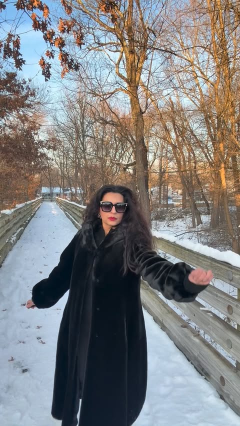 Instagram post by @_fashionby_uma_ for Guerlain. Caption reads: [...] coat: @jonesnewyork 
My lipstick: @guerlain....