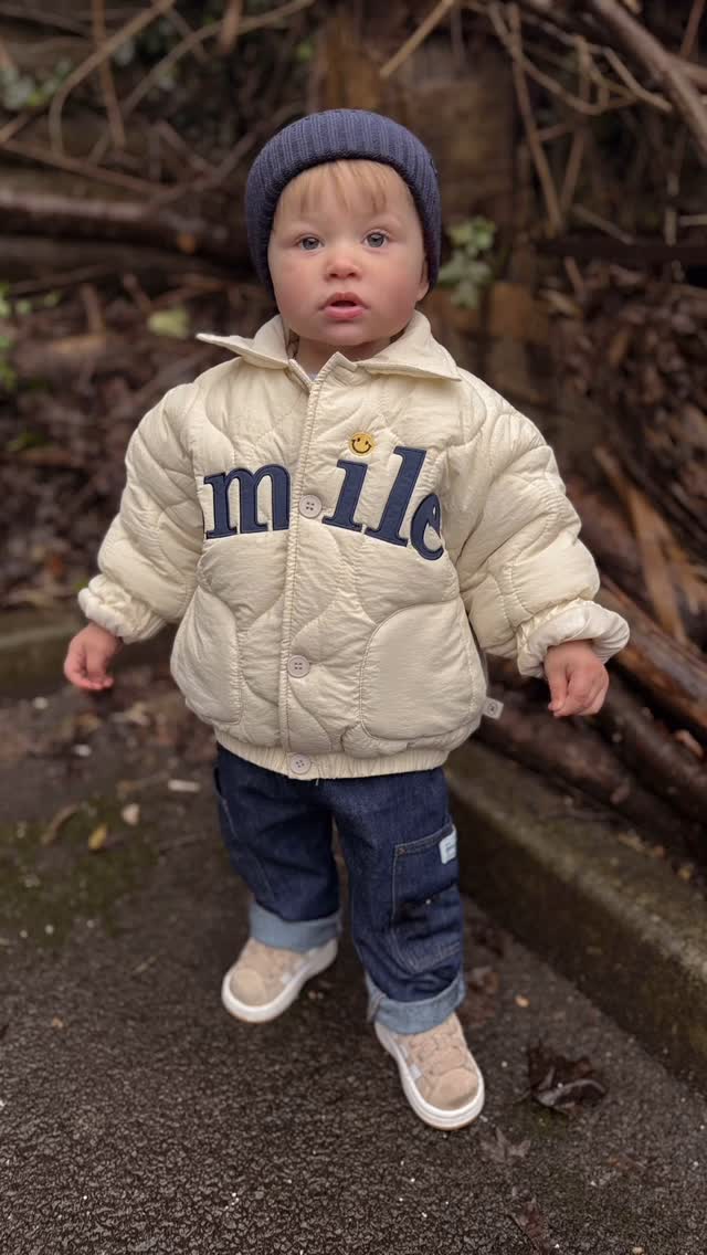 Instagram post by an influencer for MiniOlie. Caption reads: [...] kid around ✌️ jacket from @minioliestore....