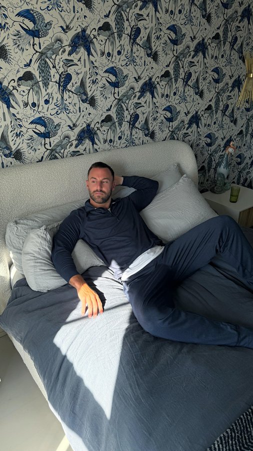 Instagram post by @sinkthesun for Men’s Wearhouse. Caption reads: My motto is always comfort without compromising....