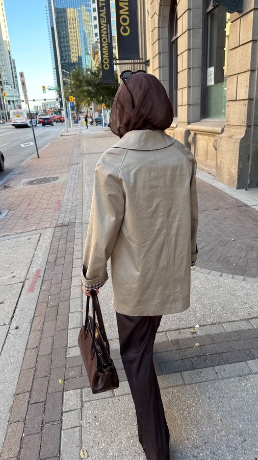 Instagram post by @sally.alhadidi for Veiled. Caption reads: modest fall styling with @veiledcollection....