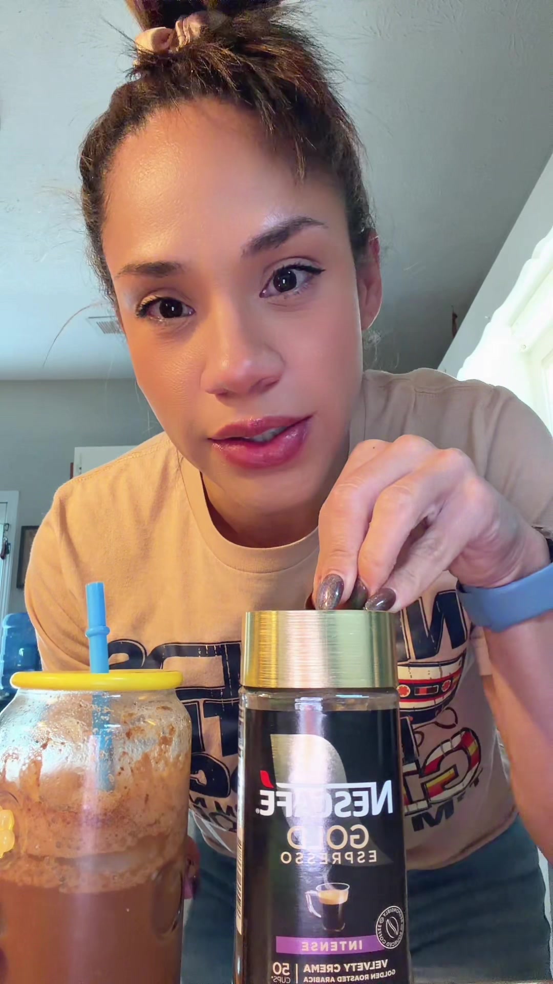 TikTok post by @lisitambusiness for KOS. Caption reads: [...] art of iced coffee at home!!!!!....