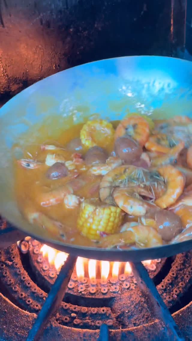 Instagram post by @mariscos_el_bigoton for Postmates. Caption reads: Shrimp in a bag! 🦐 🔥all locations @postmates....