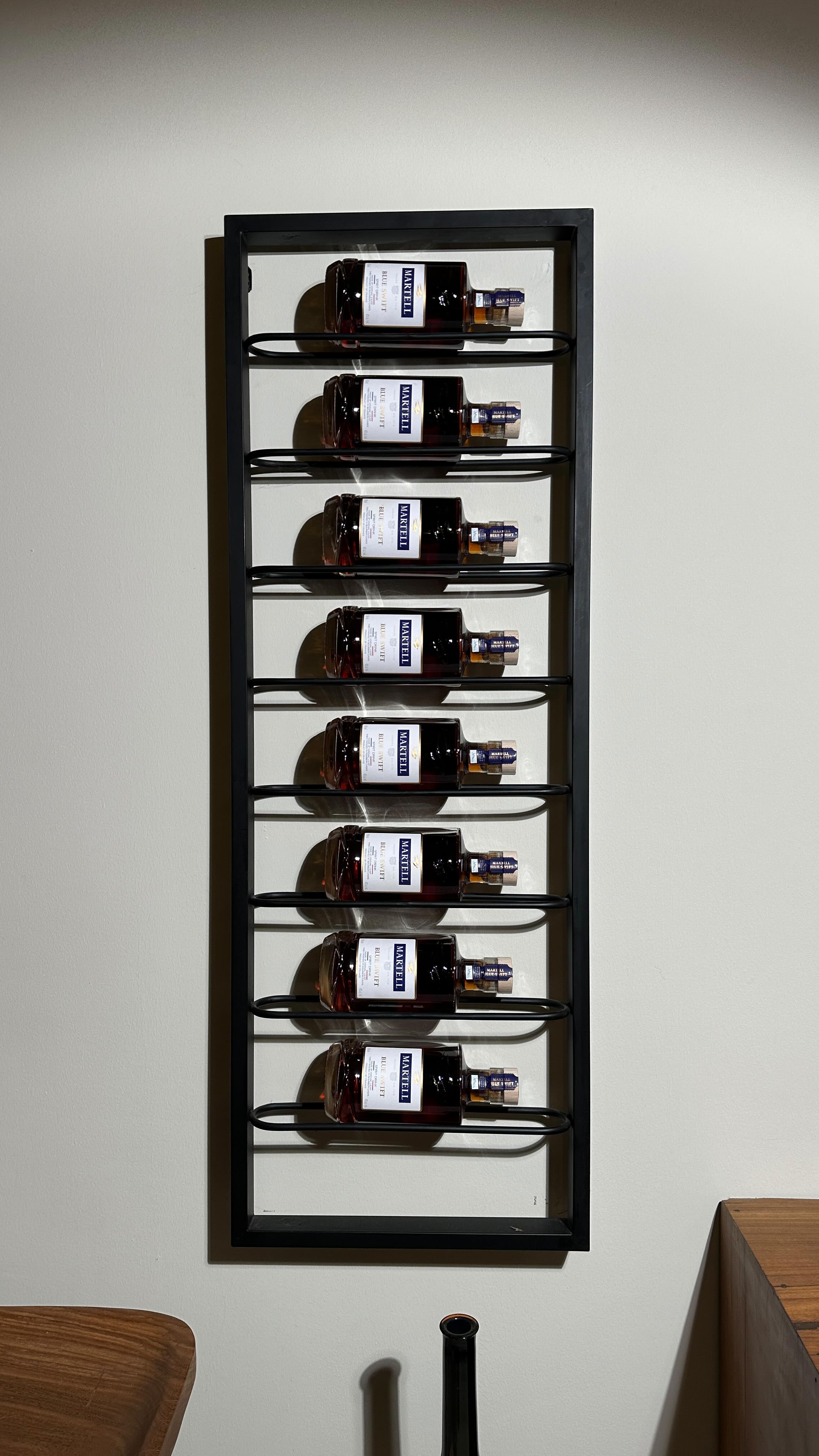 Instagram post by @tubobereni_ for Martell. Caption reads: I stack different with @martellnigeria....