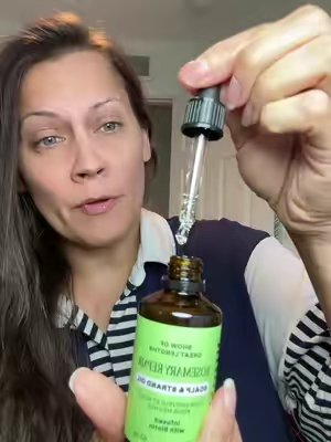 TikTok post by @candorclip for Cliganic. Caption reads: @cliganic_ Hair oil you asked for. I mentioned I....