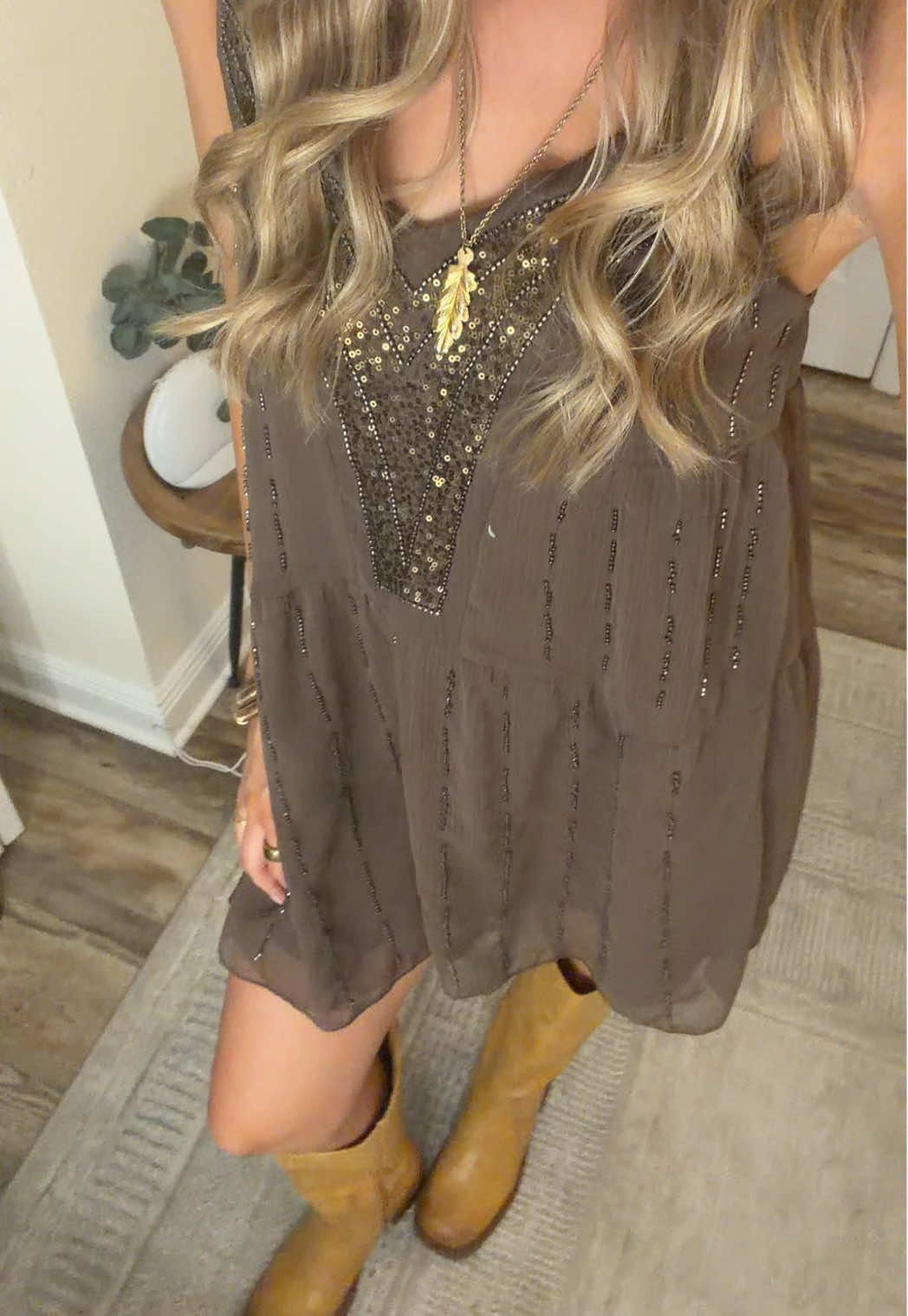 TikTok post by @maya_jilliann for Vestique. Caption reads: [...] #fryeboots #dress #ootn #outfitinspo....