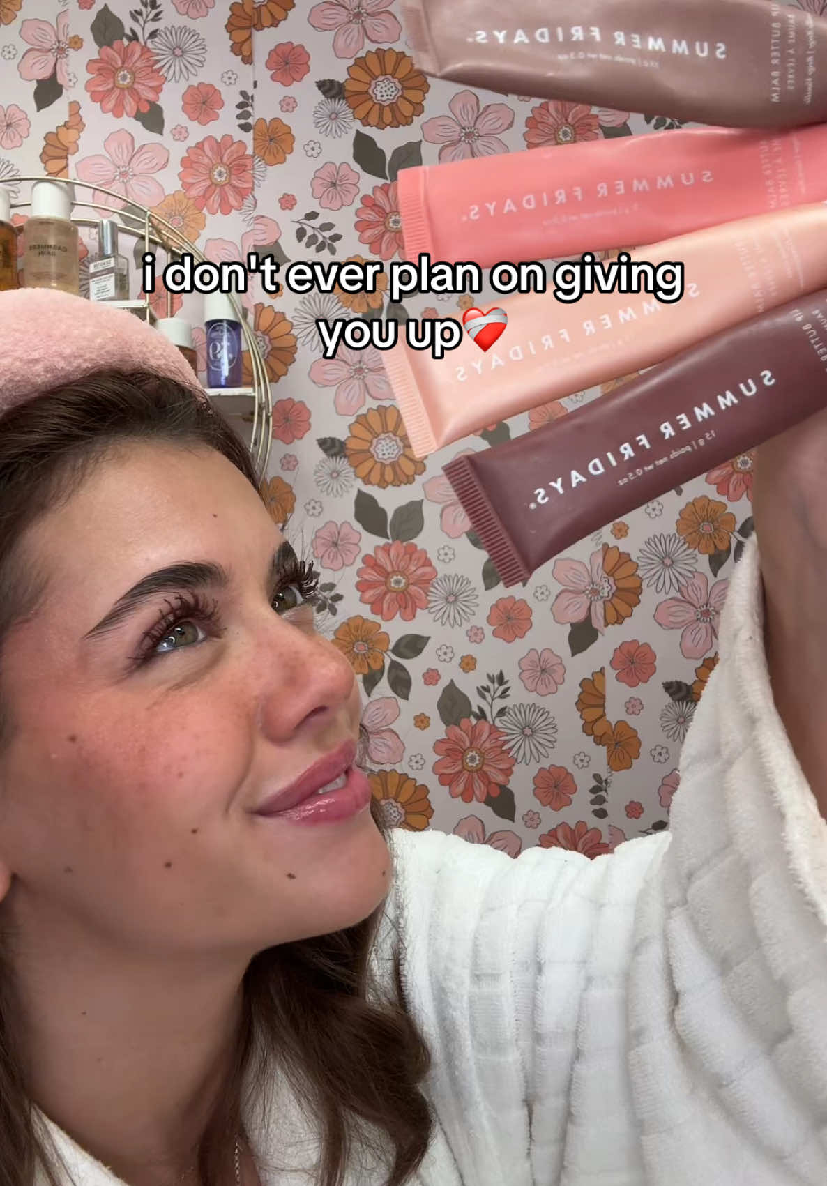 TikTok post by @peytonliveslife for Summer Fridays. Caption reads: genuine love in my eyes #lipgloss #lipbalm #makeup....