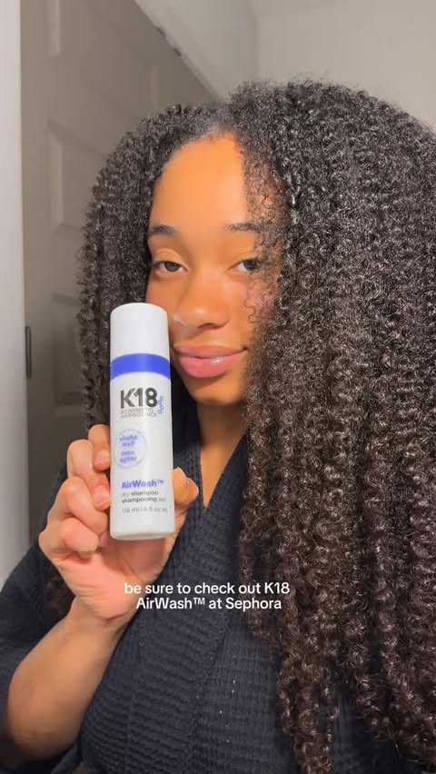 Instagram post by @alycearae for K18 Hair. Caption reads: [...] my curl friends because @k18hair AirWash™....